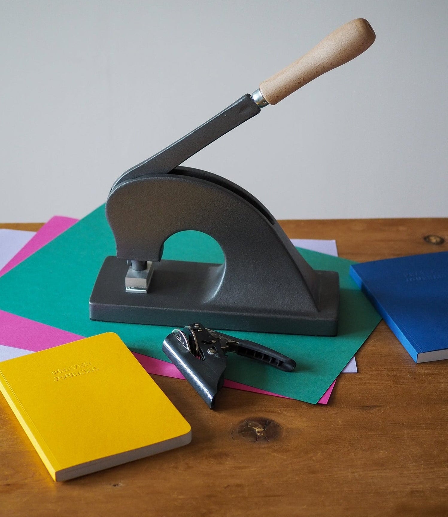 Hand embossed prayer journals made from sustainable paper.